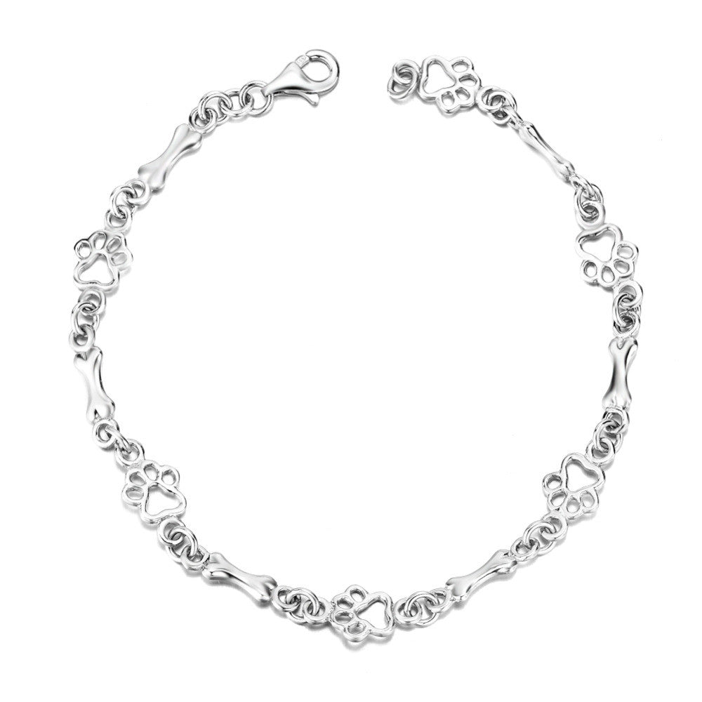 Aurembiaix™ | Paw Print and Bone Charm Bracelet in Silver