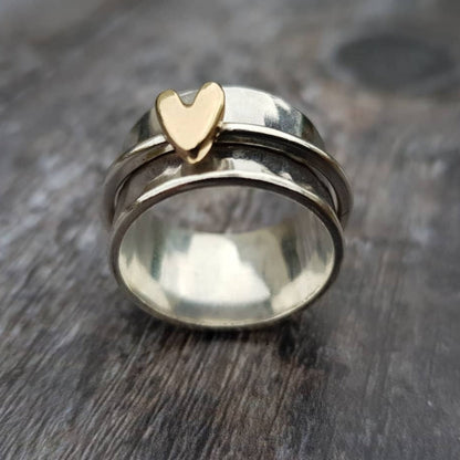 Bague en argent avec un cœur en or 