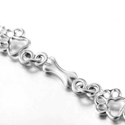 Aurembiaix™ | Paw Print and Bone Charm Bracelet in Silver