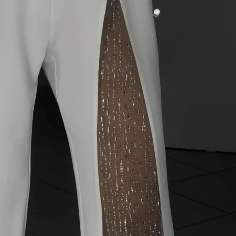 Combinaison asymétrique pour femme en maille pailletée avec haut évasé